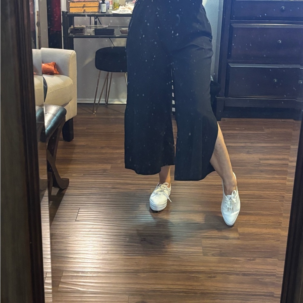 Black capri casual pants with with side leg slits and side pockets